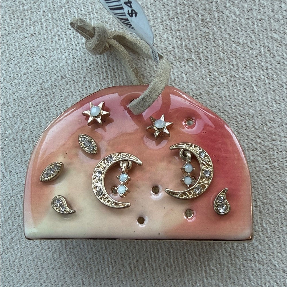 Free People Gold Moon & Star Earrings Set on Pink Gradient Card
